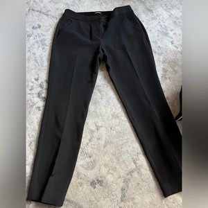 Dress pants with ruffle on pocket. Gently worn